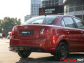 2010 Kia Rio II Рестайлинг, красный - вид 3