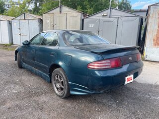 1993 Toyota Sprinter Marino, зелёный, 155000 рублей, вид 3