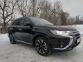 2017 Mitsubishi Outlander PHEV III Рестайлинг 2, чёрный, 2600000 рублей