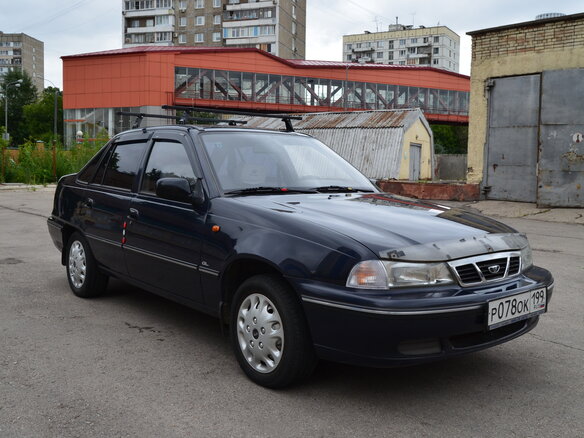 2004 Daewoo Nexia I, синий - вид 1