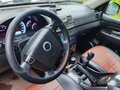 2013 SsangYong Rexton III, коричневый, 900000 рублей - вид 4