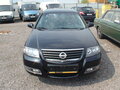 2012 Nissan Almera Classic I, чёрный - вид 1
