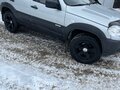 2013 Chevrolet Niva I Рестайлинг, серебристый - вид 2