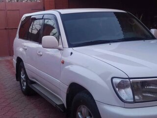2002 Toyota Land Cruiser 100 Series Рестайлинг 1, белый, 1650000 рублей, вид 3