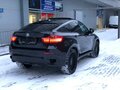2010 BMW X6 40d I (E71), чёрный - вид 1