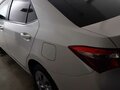 2014 Toyota Corolla XI (E160, E170, E180), белый, 1690000 рублей - вид 3