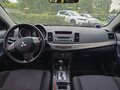 2010 Mitsubishi Lancer X, белый, 750000 рублей - вид 4