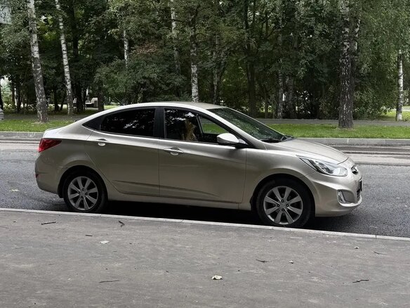 2011 Hyundai Solaris I, золотистый, 695000 рублей