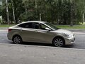 2011 Hyundai Solaris I, золотистый, 695000 рублей