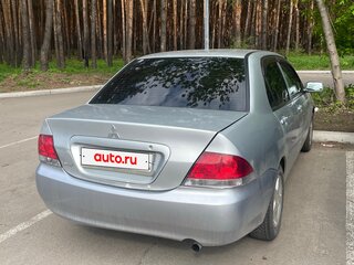 2009 Mitsubishi Lancer IX Рестайлинг, серебристый, 400000 рублей, вид 2
