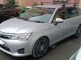 2014 Toyota Corolla Fielder XI (E160, E170, E180), серебристый, 1390000 рублей, вид 4