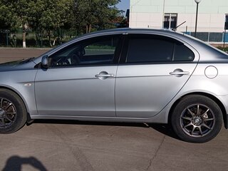 2009 Mitsubishi Lancer X, серебристый, 810000 рублей, вид 4