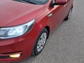 2015 Kia Rio III Рестайлинг, красный, 1100000 рублей