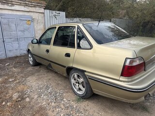 2007 Daewoo Nexia I, коричневый, 115000 рублей, вид 4