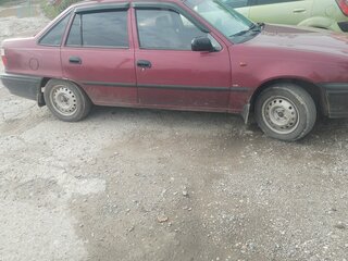 2005 Daewoo Nexia I, пурпурный, 190000 рублей, вид 2