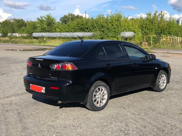 2014 Mitsubishi Lancer X Рестайлинг, чёрный, 980000 рублей - вид 10