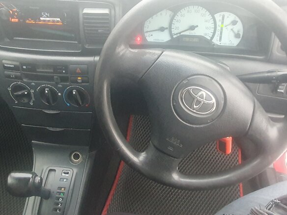 2002 Toyota Corolla Fielder IX (E120, E130), красный, 450000 рублей - вид 7