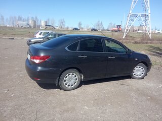 2014 Nissan Almera III (G15), чёрный, 730000 рублей, вид 2