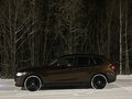 2011 BMW X1 18i I (E84), коричневый - вид 1