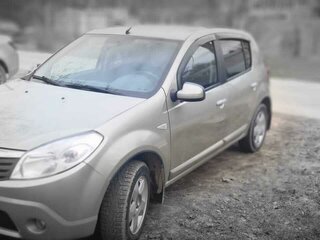 2012 Renault Sandero I, бежевый, 530000 рублей, вид 2