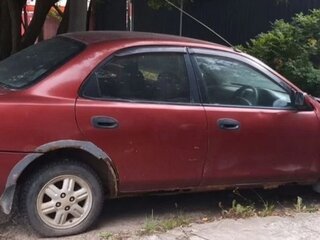 1997 Mazda Familia VII (BH), красный, 170000 рублей, вид 2