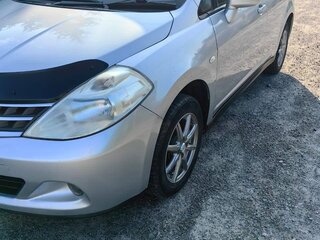 2012 Nissan Tiida I, серебристый, 750000 рублей, вид 1