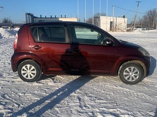 2009 Toyota Passo I (C10), коричневый, 520000 рублей, вид 2