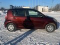 2009 Toyota Passo I (C10), коричневый, 520000 рублей - вид 1