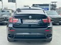 2012 BMW X6 35i I (E71) Рестайлинг, чёрный - вид 5