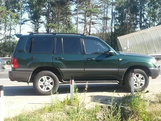 2004 Toyota Land Cruiser 100 Series Рестайлинг 1, зелёный, 3200000 рублей, вид 2