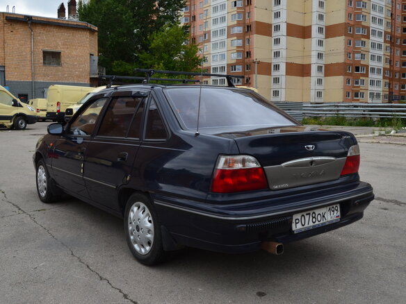 2004 Daewoo Nexia I, синий - вид 3