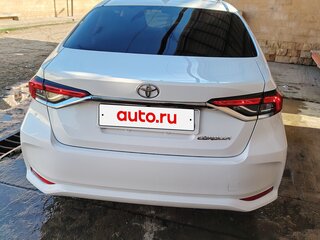 2022 Toyota Corolla XII (E210), белый, 2100000 рублей, вид 2