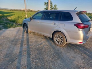 2016 Toyota Corolla Fielder XI (E160, E170, E180), серебристый, 1050000 рублей, вид 2