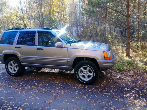 1998 Jeep Grand Cherokee I (ZJ) Рестайлинг, серебристый - вид 2
