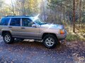 1998 Jeep Grand Cherokee I (ZJ) Рестайлинг, серебристый - вид 2