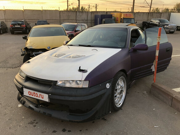 1994 Opel Calibra, пурпурный - вид 1