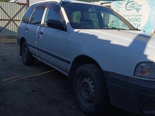 1998 Nissan Wingroad I (Y10), белый, 320000 рублей, вид 1