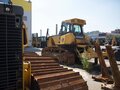 2011 John Deere 850J, золотистый - вид 2