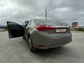 2013 Toyota Corolla XI (E160, E170, E180), серебристый, 1290000 рублей, вид 3