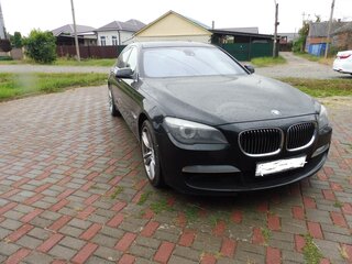 2010 BMW 7 серии Long 750Li xDrive V (F01/F02/F04), чёрный, 2000000 рублей, вид 1