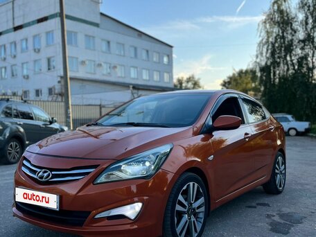 2015 Hyundai Solaris I Рестайлинг, оранжевый, 750000 рублей, вид 1