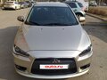 2011 Mitsubishi Lancer X Рестайлинг, бежевый, 1100000 рублей - вид 1