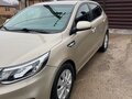 2015 Kia Rio III Рестайлинг, бежевый, 1090000 рублей