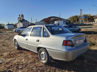 2012 Daewoo Nexia I Рестайлинг, серебристый, 320000 рублей, вид 3