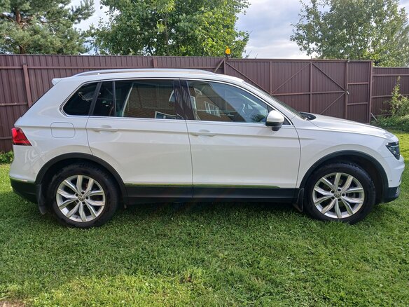 2016 Volkswagen Tiguan II, белый - вид 4
