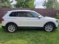 2016 Volkswagen Tiguan II, белый - вид 4