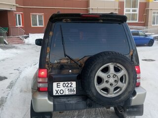 1996 Mitsubishi Pajero Junior, чёрный, 450000 рублей, вид 5