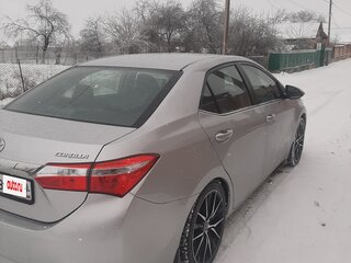 2013 Toyota Corolla XI (E160, E170, E180), серебристый, 1290000 рублей, вид 2