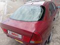 1998 Mitsubishi Carisma I, красный, 89999 рублей - вид 7