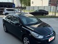 2013 Hyundai Solaris I, чёрный, 690000 рублей - вид 1